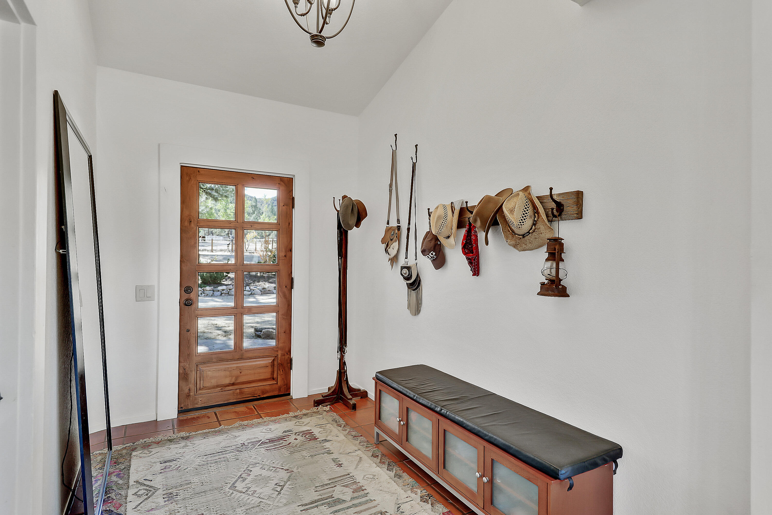 60195 Hop Patch Spring Road Mountain Center, CA 92561 - Photo 5 of 50 a view of a hallway with windows and workspace