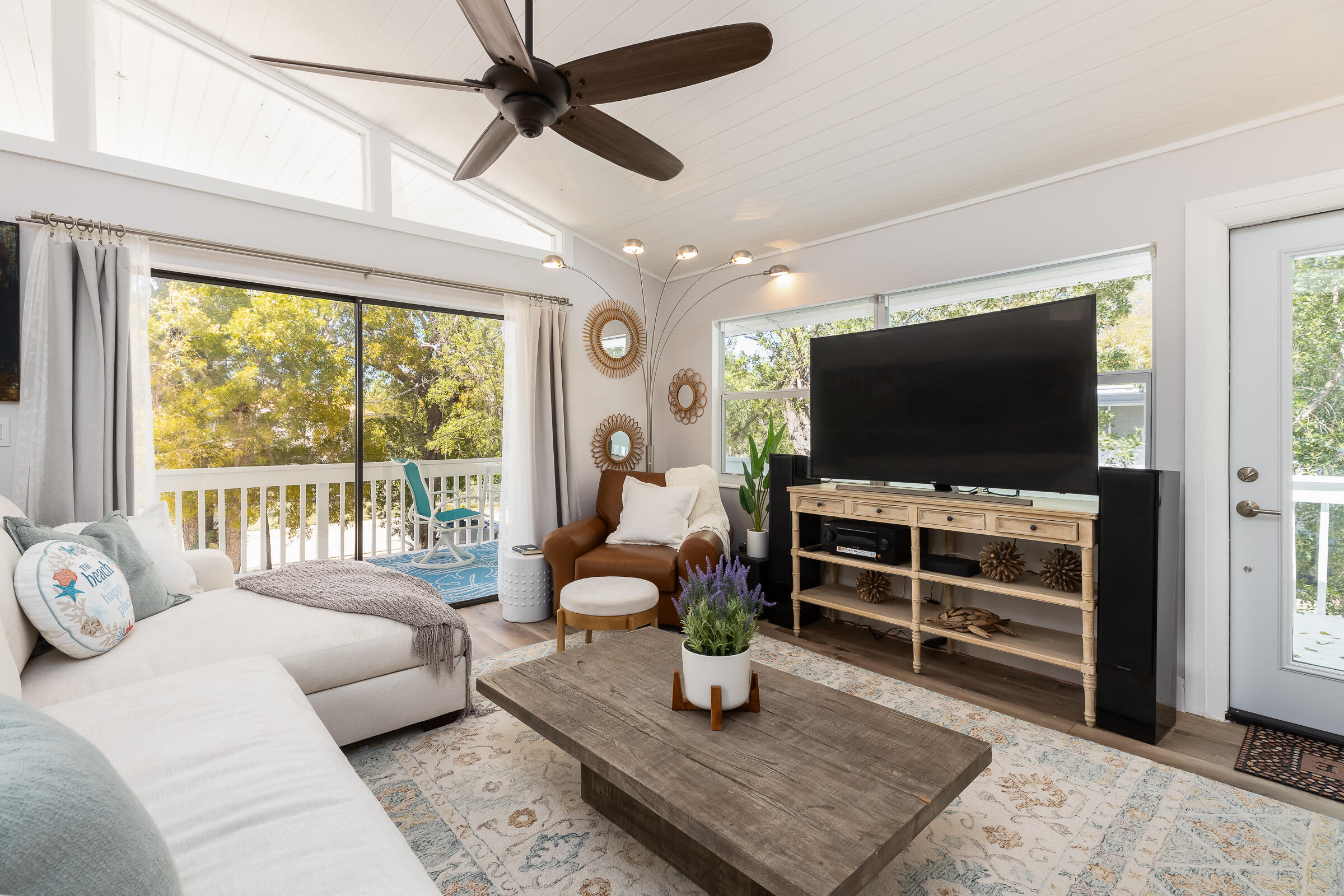 15 Sunset Road Key Largo, FL 33037 - Photo 11 of 58 a living room with furniture and a flat screen tv
