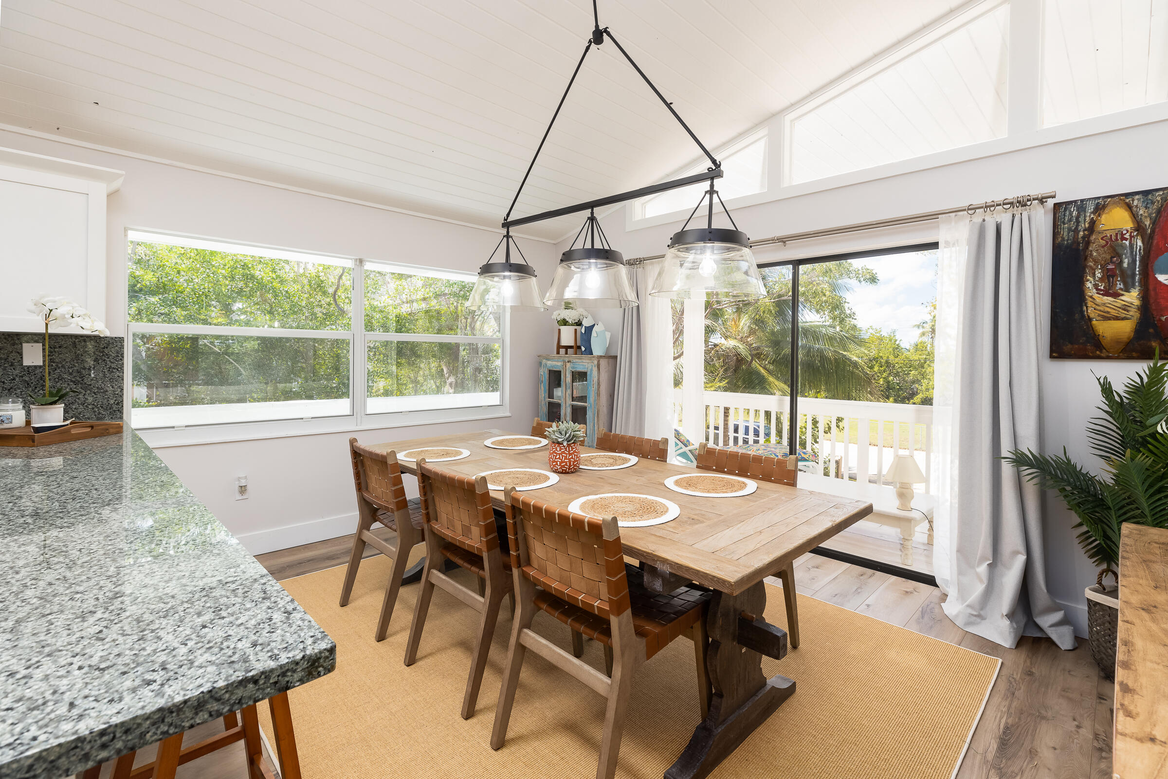 15 Sunset Road Key Largo, FL 33037 - Photo 14 of 58 a view of a dining room with furniture window and outside view