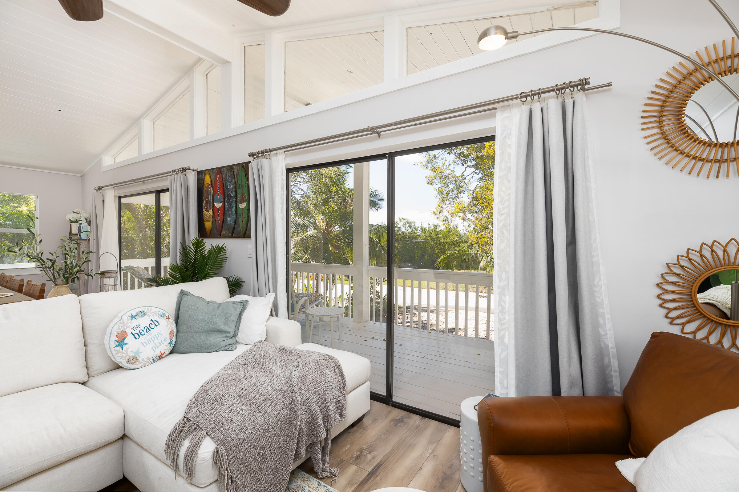 15 Sunset Road Key Largo, FL 33037 - Photo 21 of 58 a living room with furniture and a large window