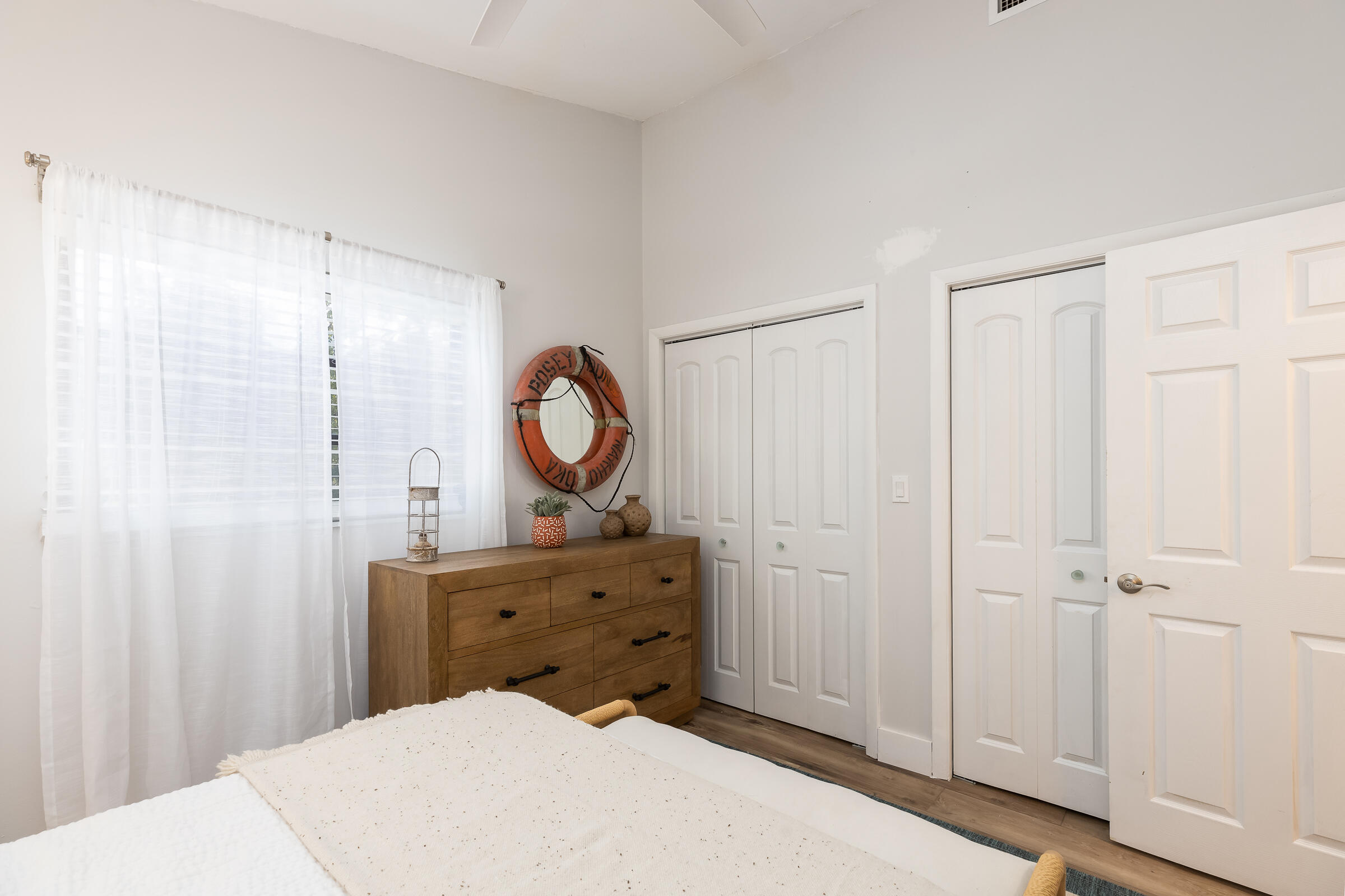 15 Sunset Road Key Largo, FL 33037 - Photo 31 of 58 a bed room with a bed mirror and a window