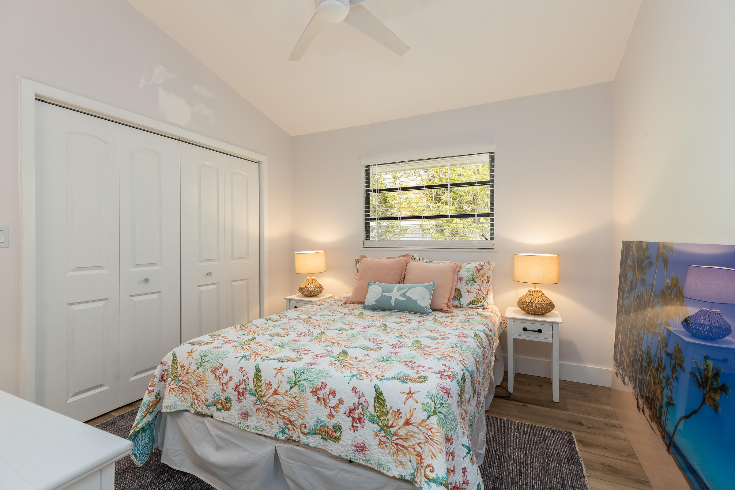 15 Sunset Road Key Largo, FL 33037 - Photo 33 of 58 a bedroom with a bed and a window