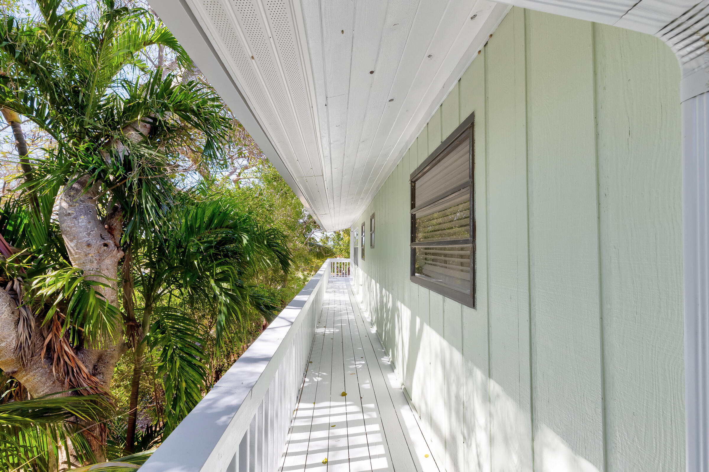 15 Sunset Road Key Largo, FL 33037 - Photo 41 of 58 a view of a pathway of a house