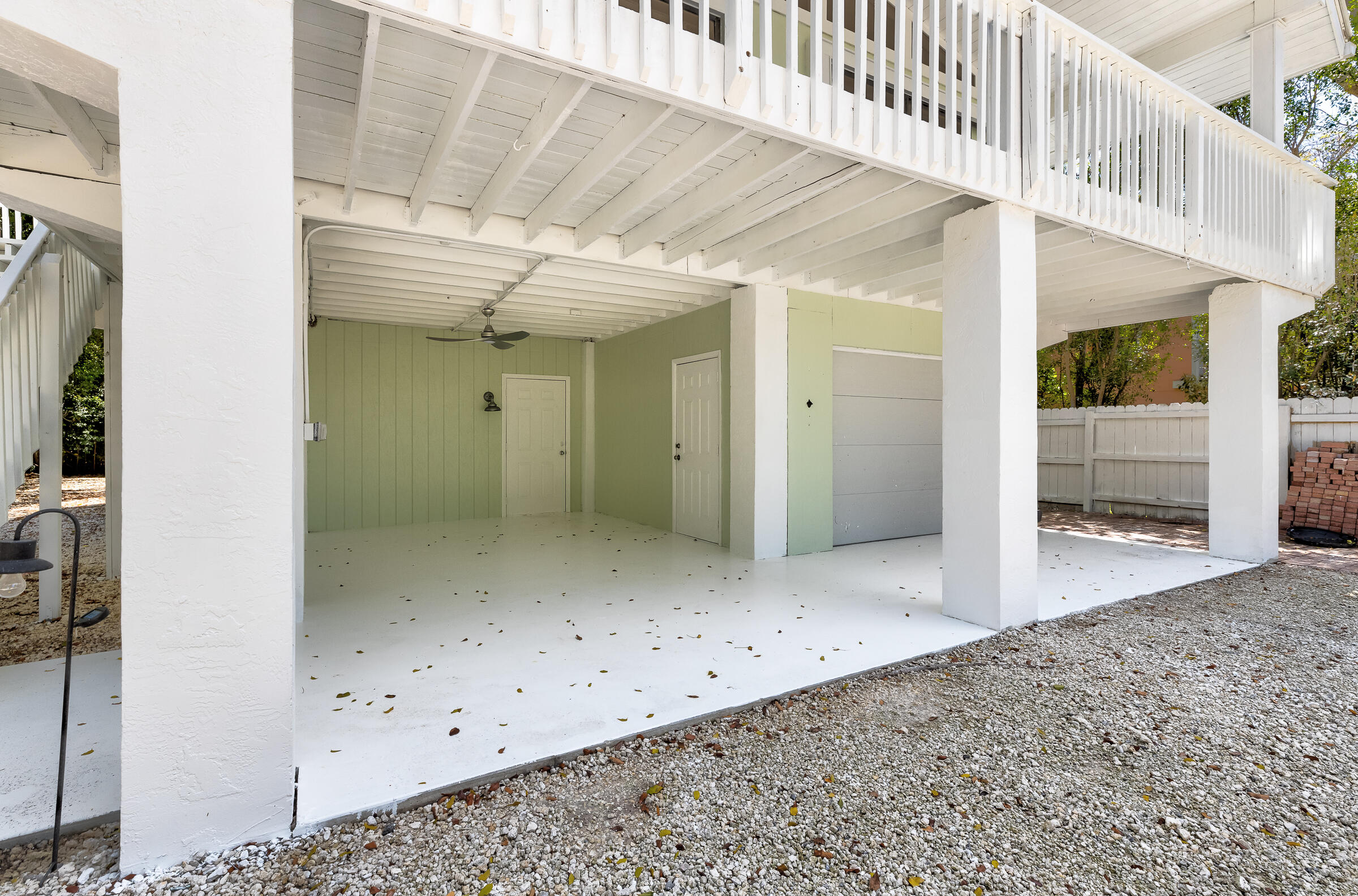 15 Sunset Road Key Largo, FL 33037 - Photo 9 of 58 a view of a hallway with wooden floor