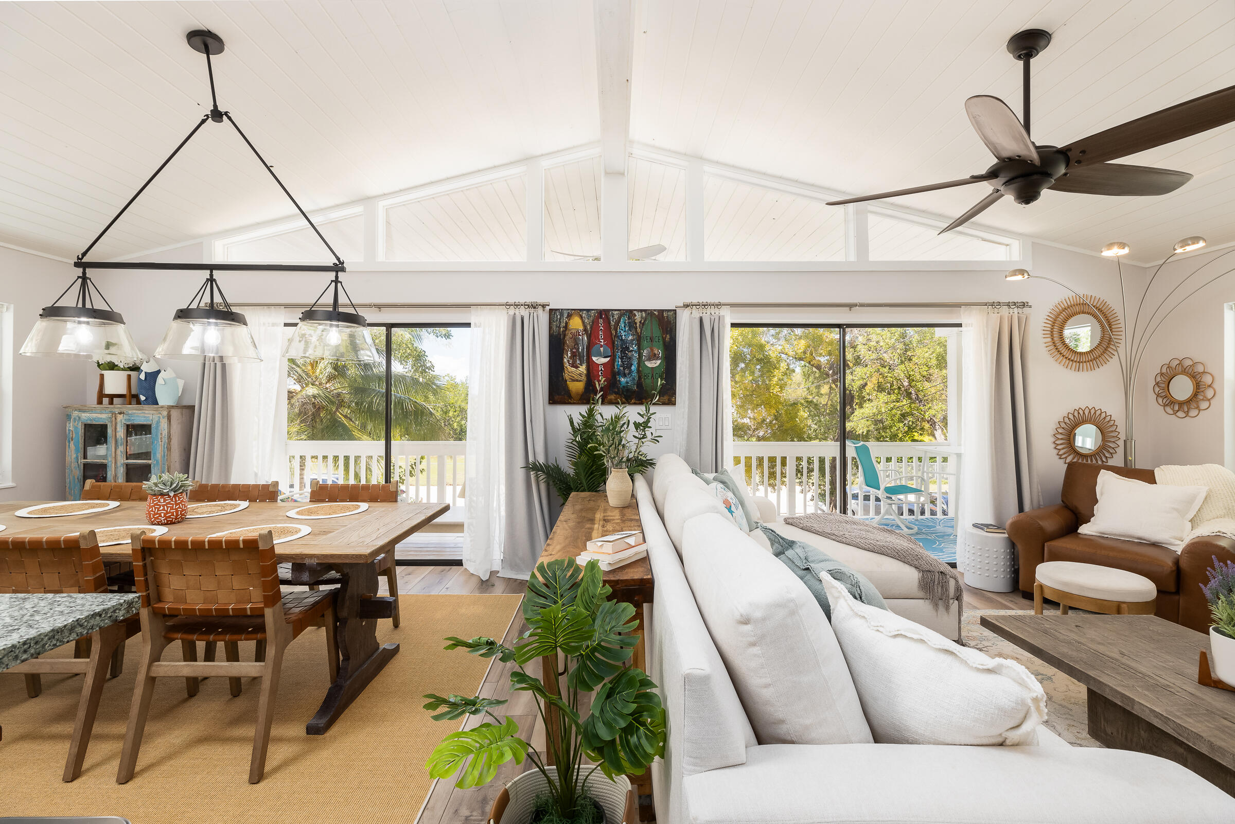 15 Sunset Road Key Largo, FL 33037 - Photo 10 of 58 a living room with furniture and a large window