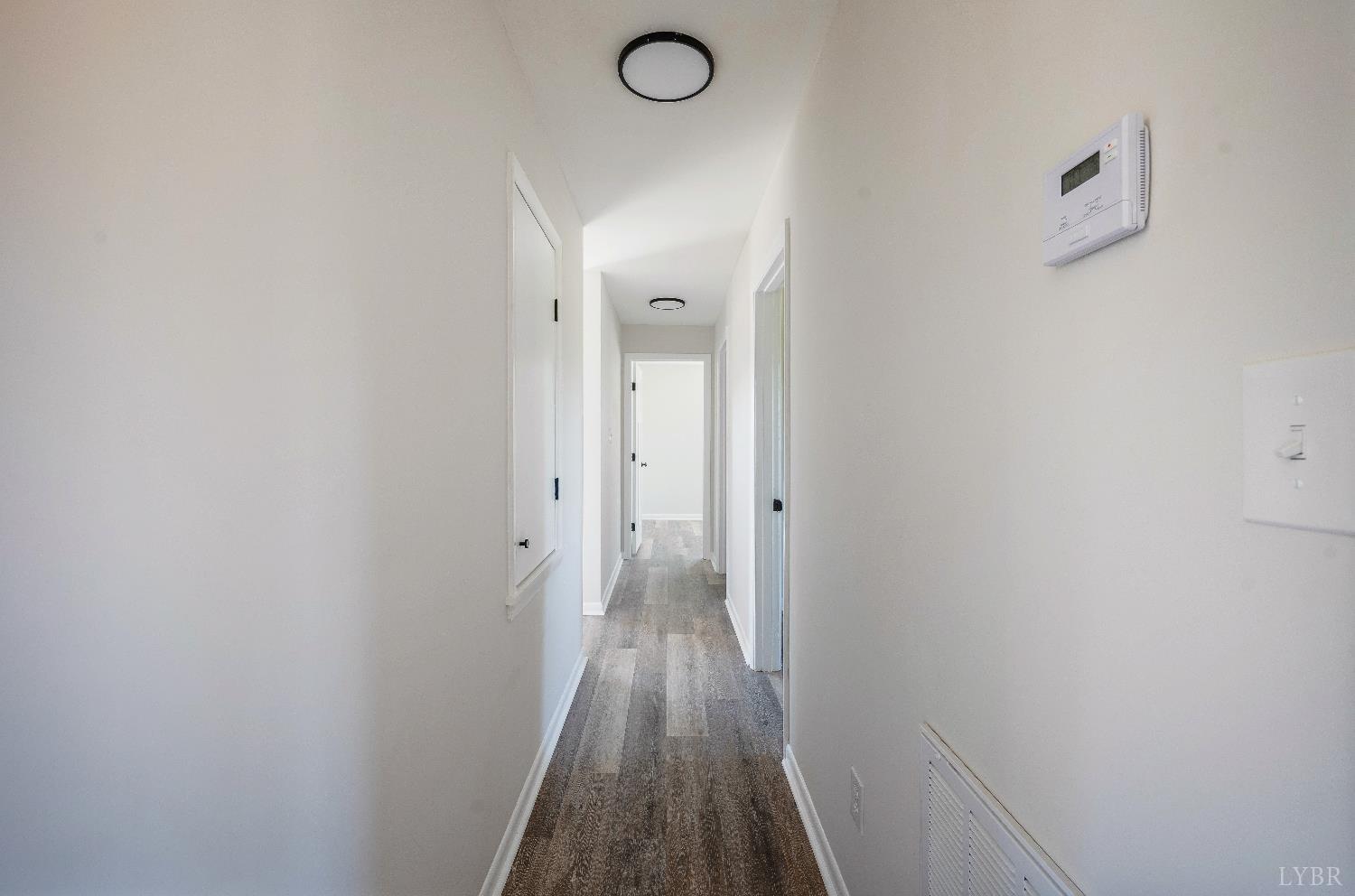 333 North Main Street Amherst, VA 24521 - Photo 21 of 56 a view of a hallway with wooden floor