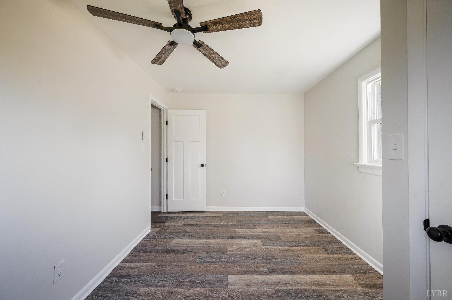 333 North Main Street Amherst, VA 24521 - Photo 28 of 56 a view of room with window and a ceiling fan