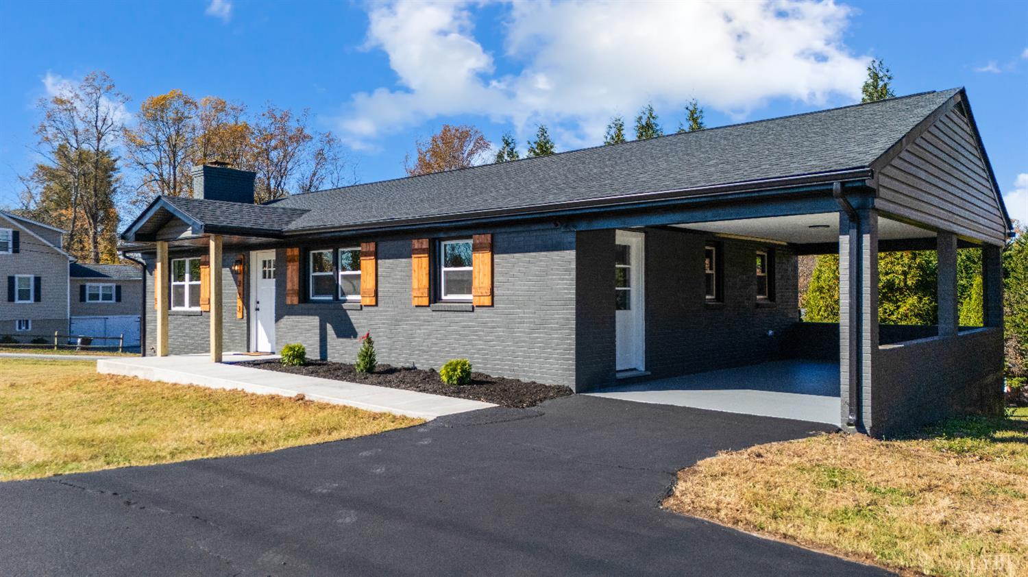 333 North Main Street Amherst, VA 24521 - Photo 42 of 56 a view of a house with backyard porch and sitting area