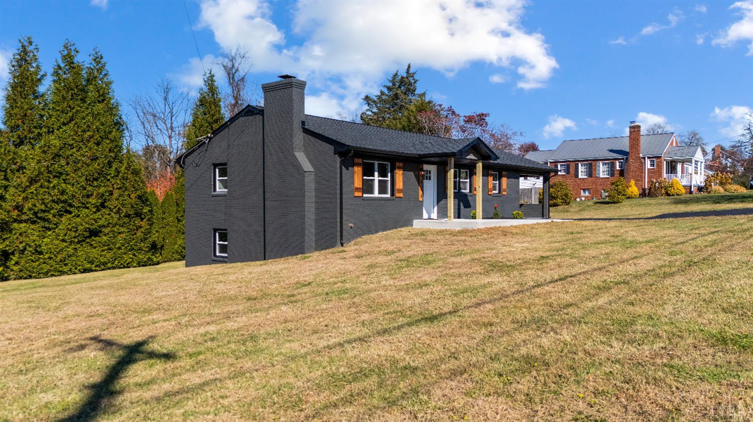 333 North Main Street Amherst, VA 24521 - Photo 43 of 56 a front view of a house with a yard