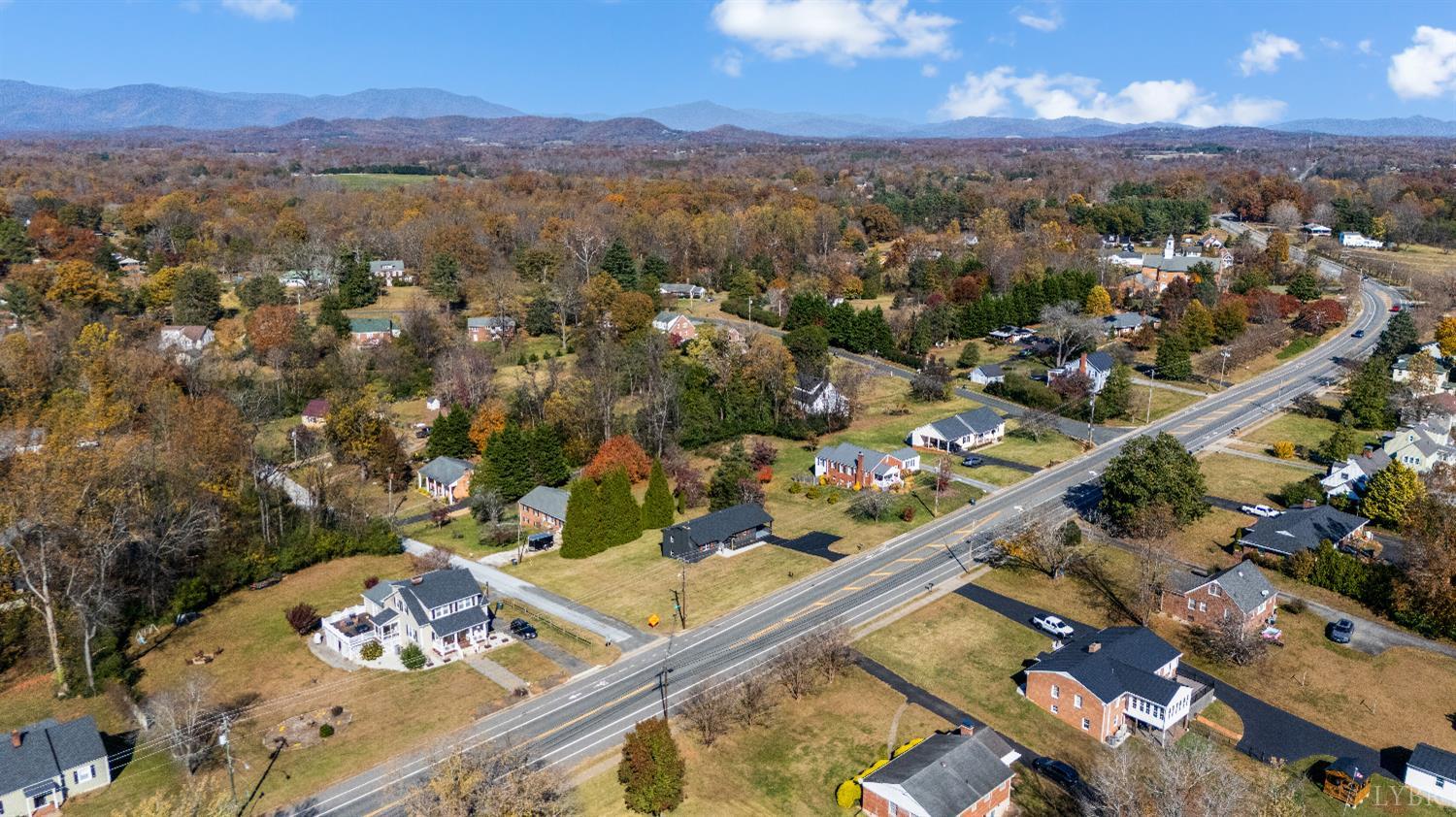 333 North Main Street Amherst, VA 24521 - Photo 50 of 56 an aerial view of a city with lots of residential buildings ocean and mountain view in back