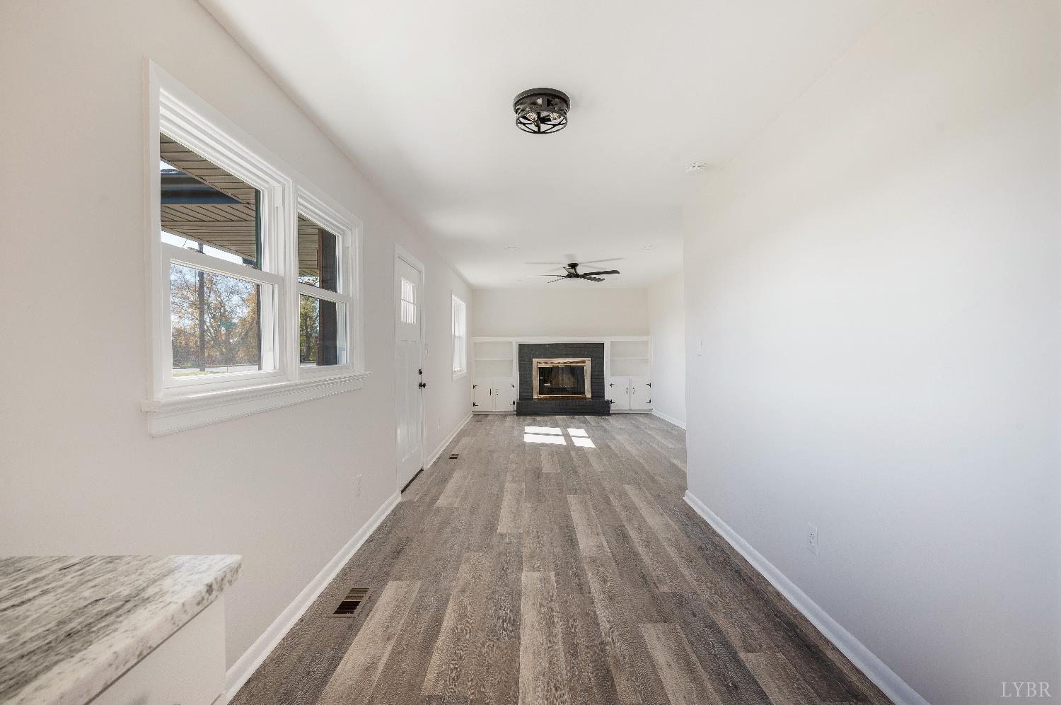 333 North Main Street Amherst, VA 24521 - Photo 7 of 56 a view of livingroom with furniture and fireplace