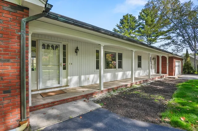 a front view of a house with a patio