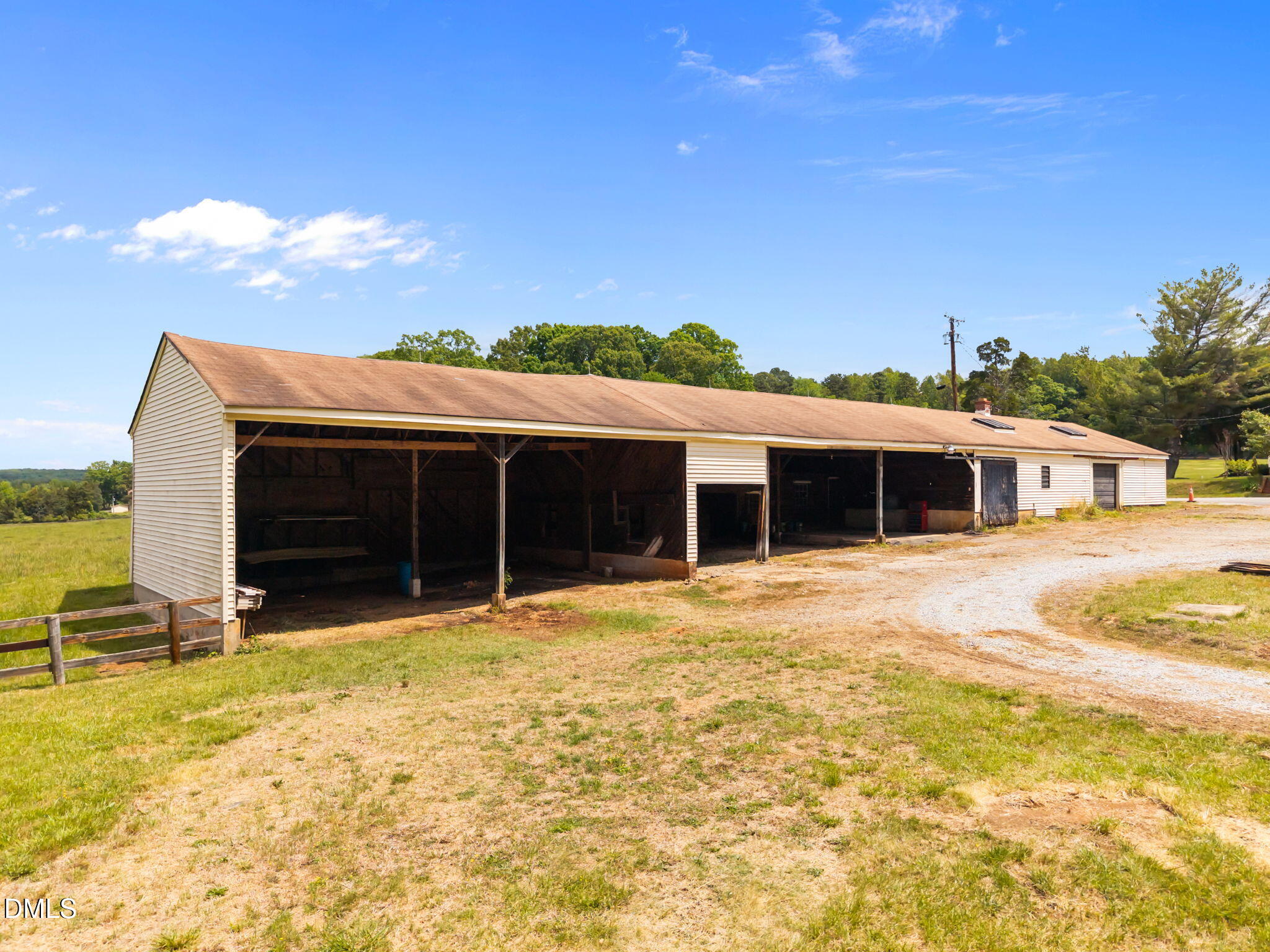 423 Quail Roost Farm Road Rougemont, NC 27572 - Photo 26 of 44 a front view of a house with a yard