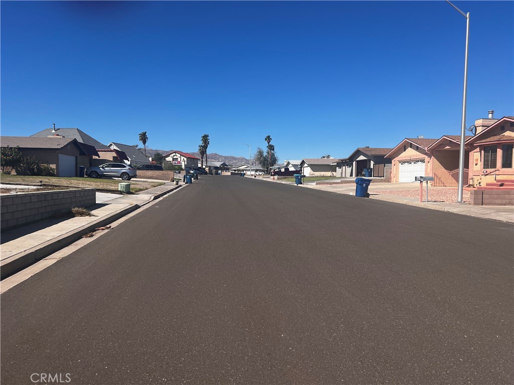 0 2031 Carty Place Needles, CA 92363 - Photo 5 of 12 a view of a city street and a car parked on the road
