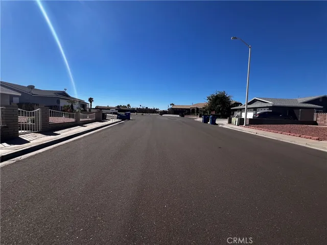 a view of a street with cars