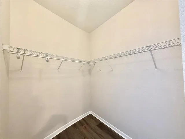 a view of a room with racks on the wall