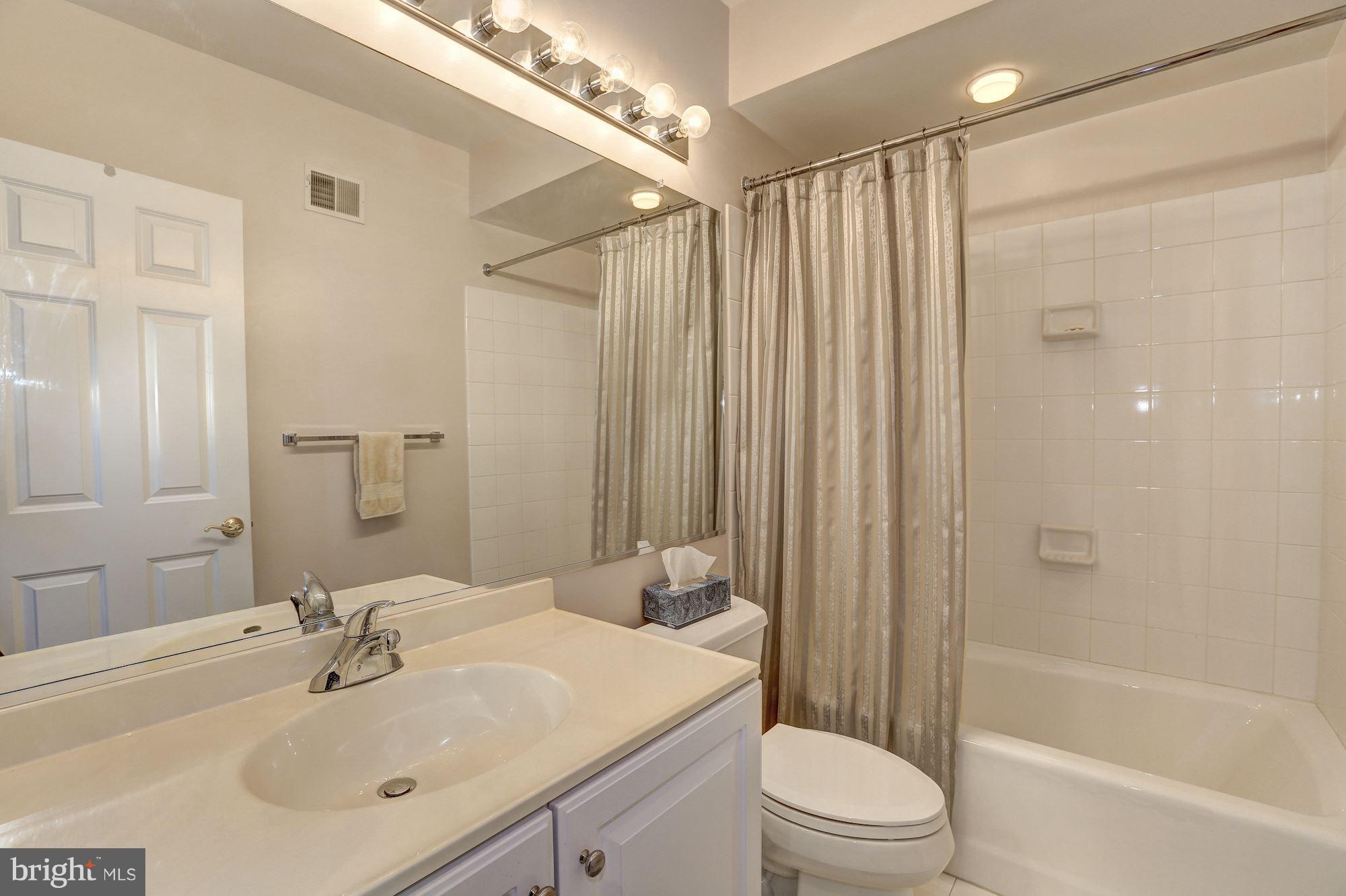 7463 Arlington Road Bethesda, MD 20814 - Photo 21 of 30 Second Upper Level Bathroom 1