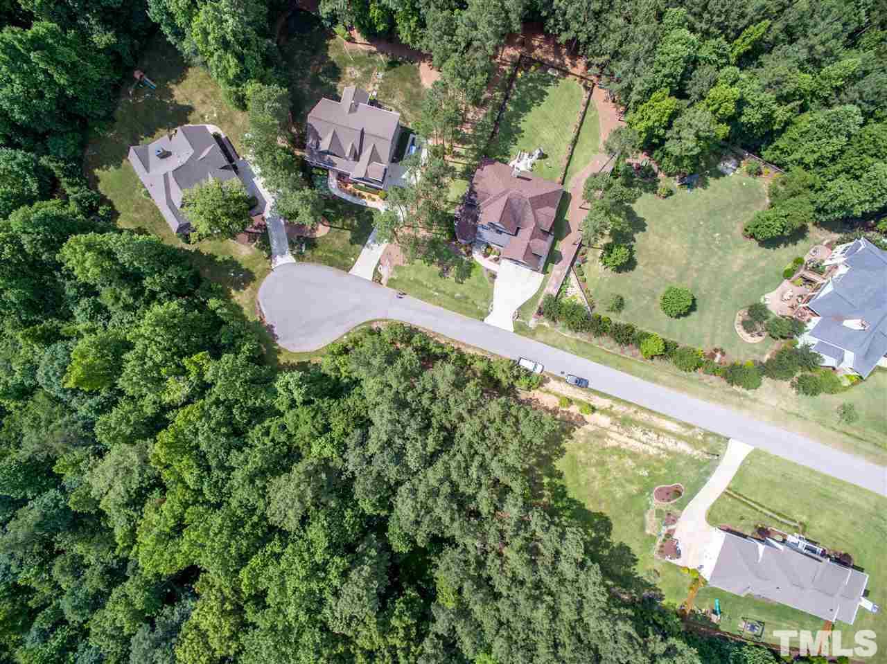 4717 Preserve Road Raleigh, NC 27610 - Photo 2 of 6 an aerial view of residential houses with outdoor space and street view