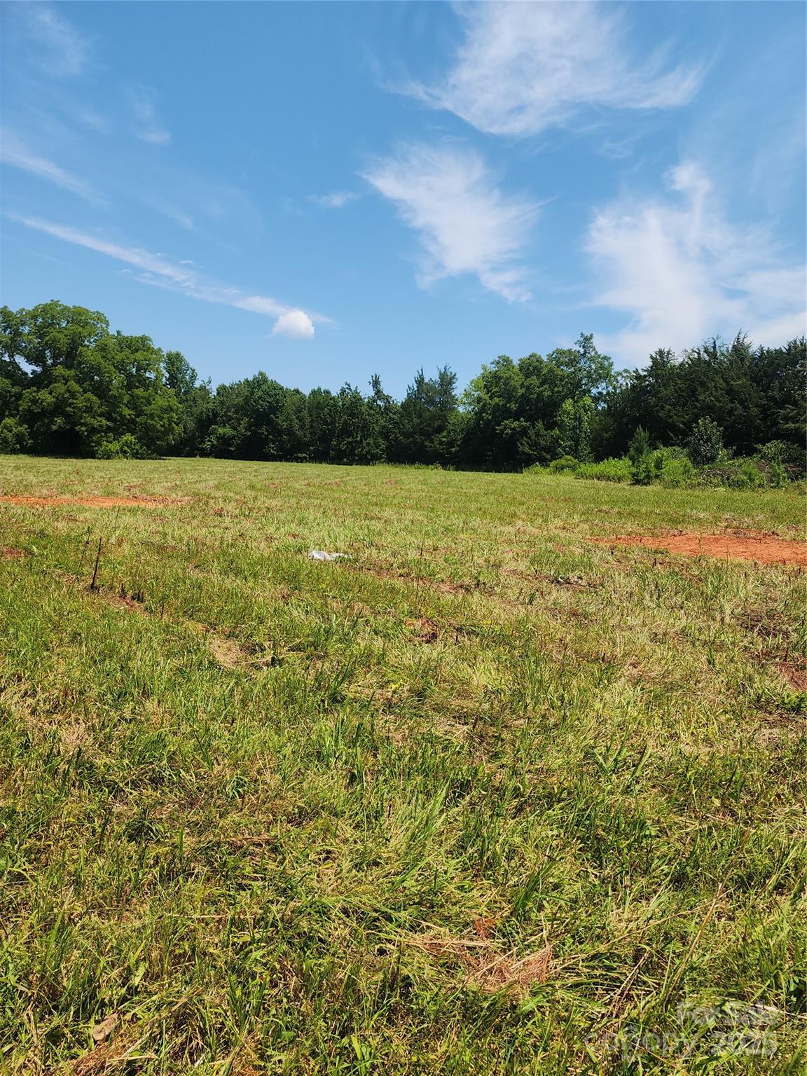 9113 Brief Road Mint Hill, NC 28227 - Photo 5 of 5 a view of a field with an ocean