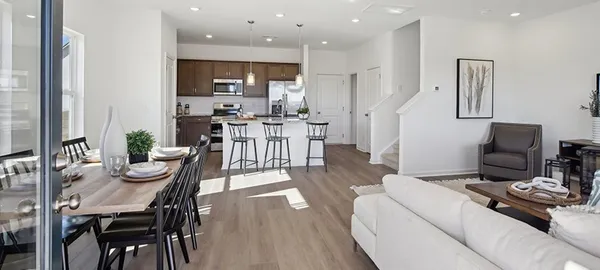 a view of a dining room with furniture