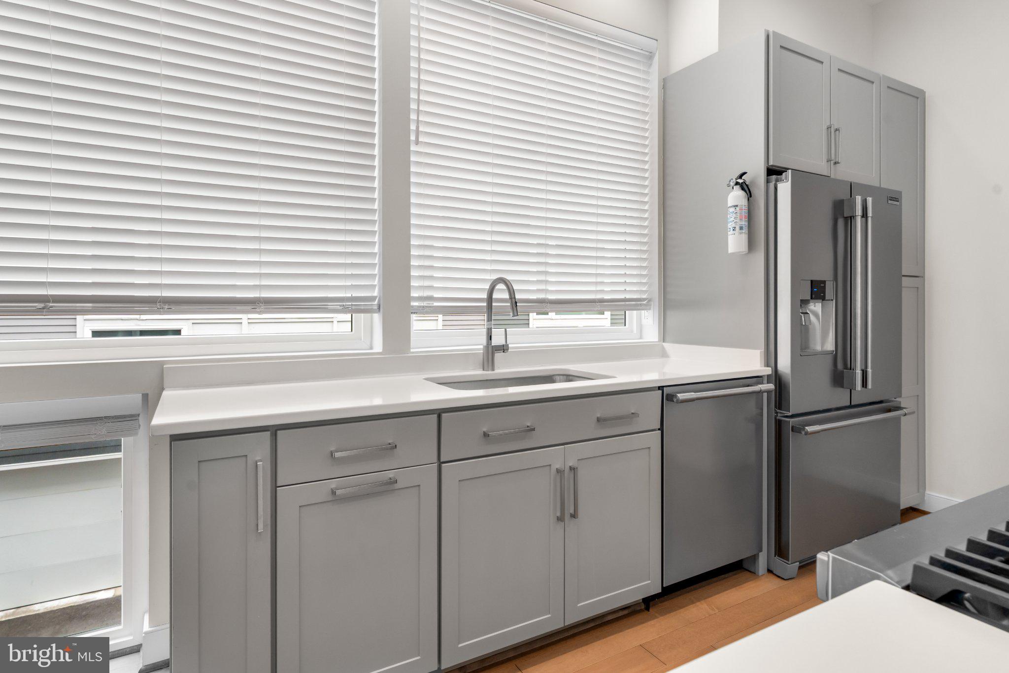 2827 24th Road South Arlington, VA 22206 - Photo 20 of 48 Sleek modern kitchen with natural light.