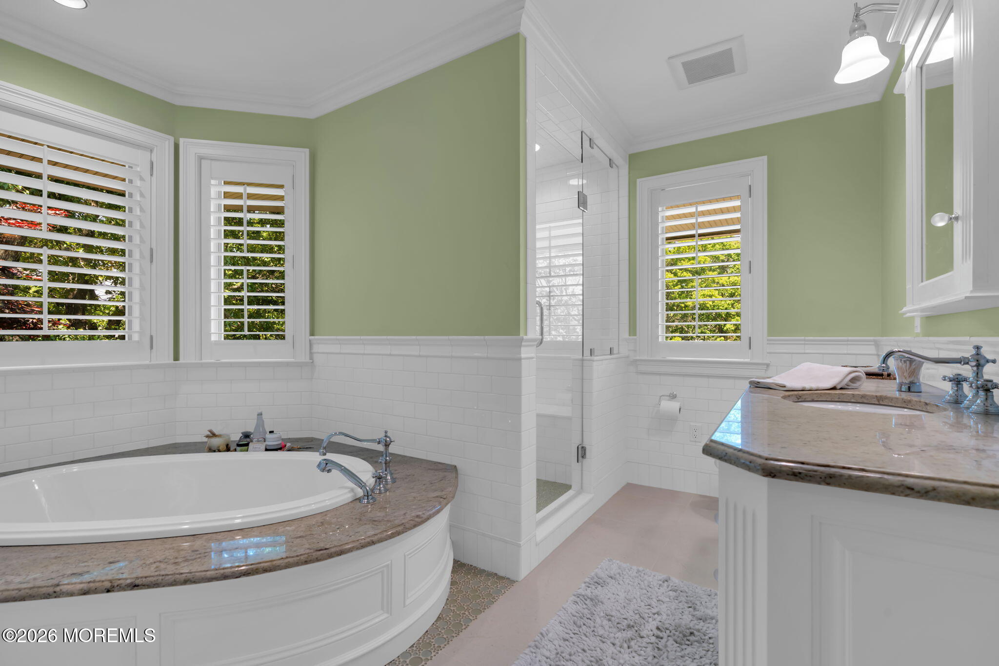 672 Winding River Road Brick, NJ 08724 - Photo 48 of 111 a bath tub sitting in a bathroom next to a window