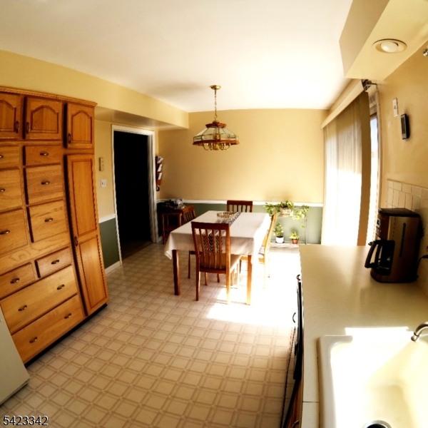 13 Summerall Road Somerset, NJ 08873 - Photo 11 of 21 a living room with furniture and a flat screen tv
