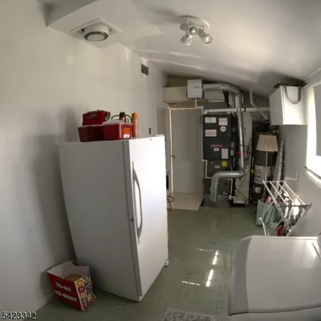 a living room with lots of furniture and a couch