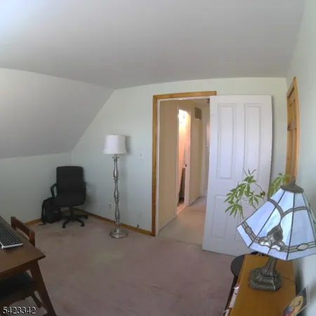 a workspace with furniture and wooden floor