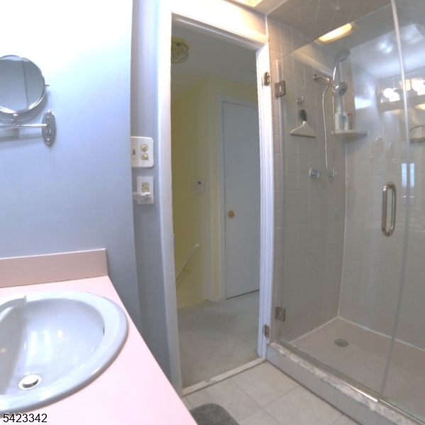 13 Summerall Road Somerset, NJ 08873 - Photo 16 of 21 a bathroom with a sink and a mirror