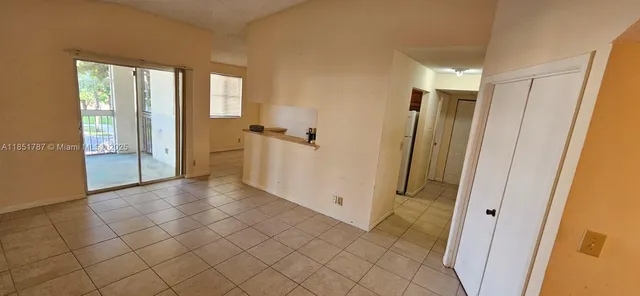 a kitchen with a stove and a microwave