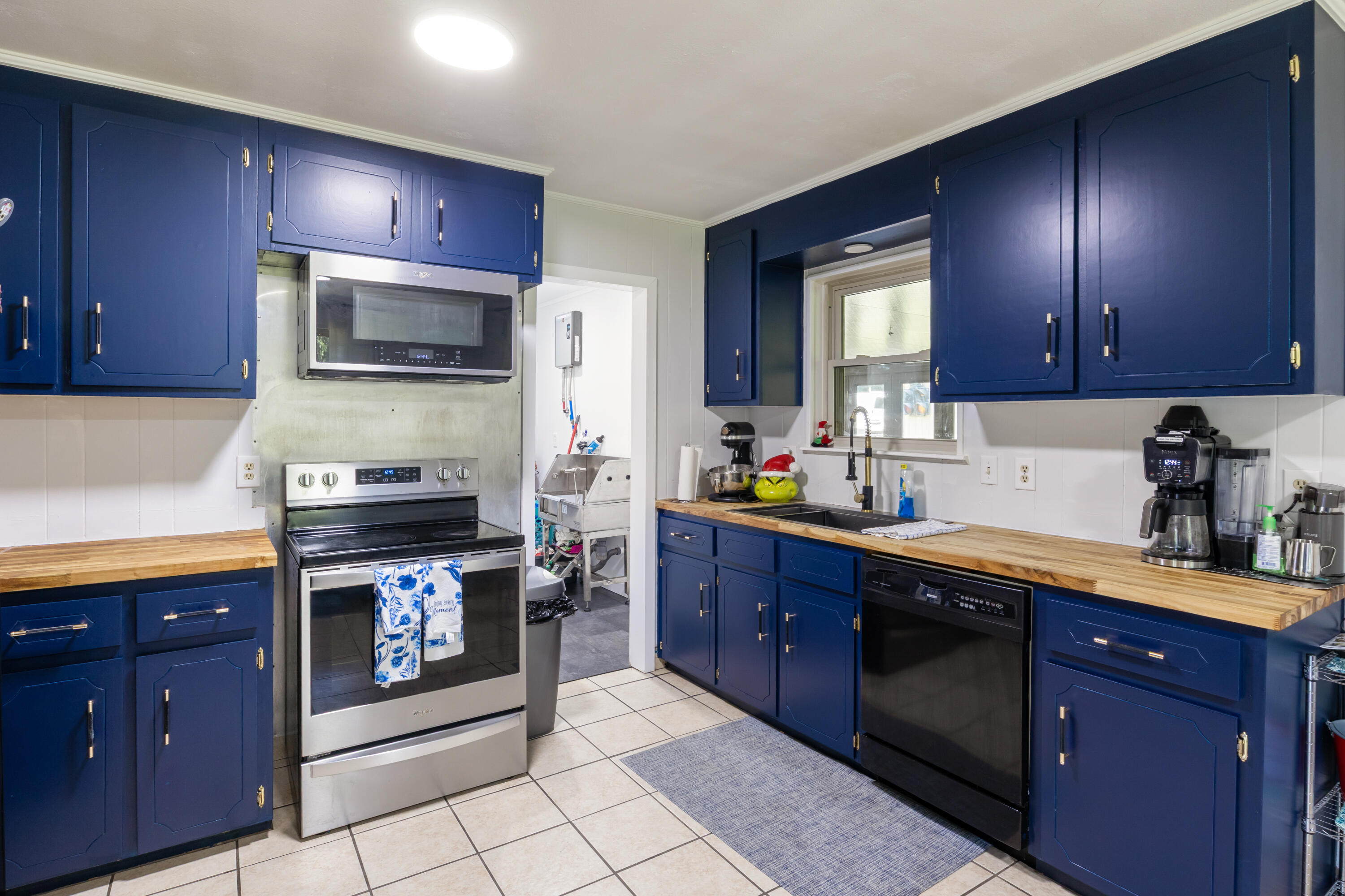 464 Tall Pines Road Cantonment, FL 32533 - Photo 8 of 22 Kitchen and laundry