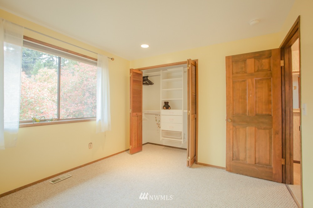 5558 West Mercer Way Mercer Island, WA 98040 - Photo 11 of 20 a view of an empty room with a window