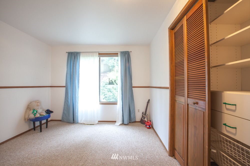 5558 West Mercer Way Mercer Island, WA 98040 - Photo 12 of 20 a view of empty room with windows