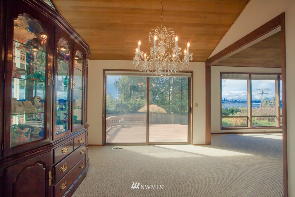 5558 West Mercer Way Mercer Island, WA 98040 - Photo 5 of 20 a view of an empty room with a windows
