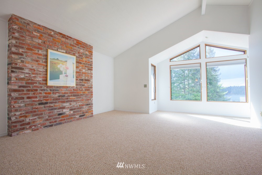 5558 West Mercer Way Mercer Island, WA 98040 - Photo 8 of 20 a view of an empty room with a window