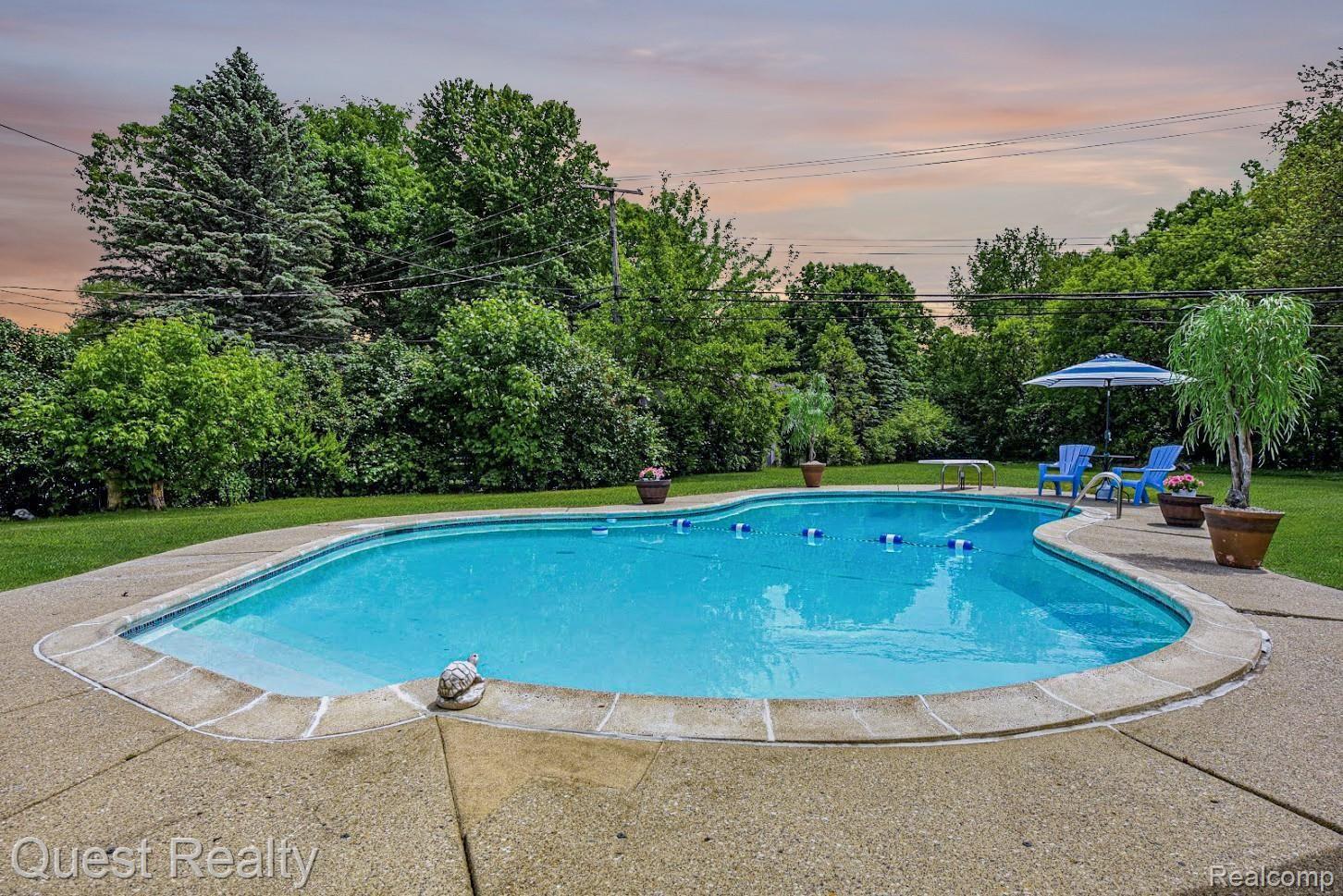 6115 Hatchery Road Waterford, MI 48327 - Photo 2 of 50 pool twilight .jpg