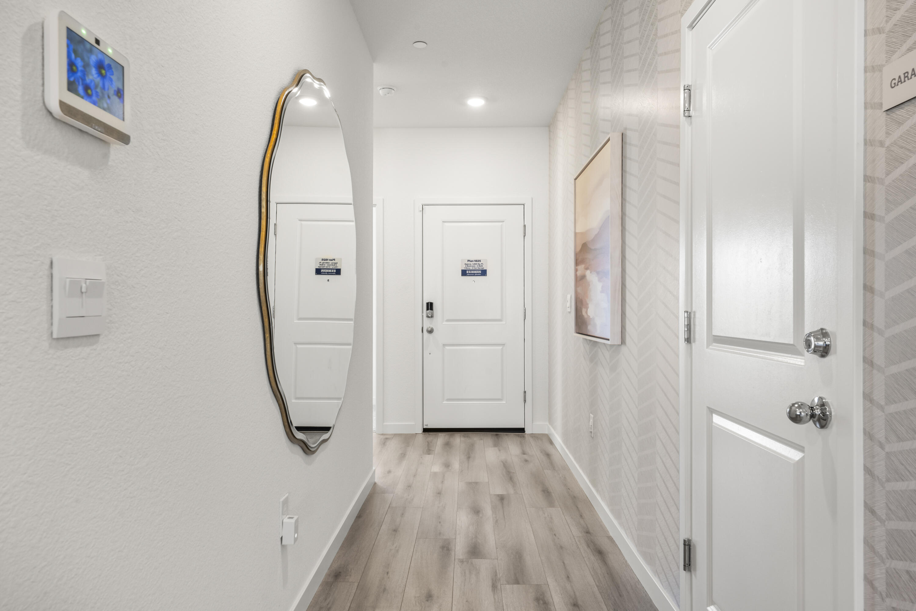 5240 Monaco Parkway Redding, CA 96002 - Photo 2 of 7 a view of a hallway with wooden floor and entryway