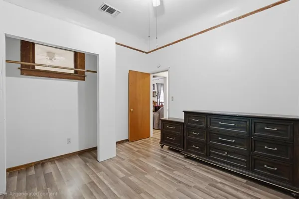 a view of a dresser with wooden floor