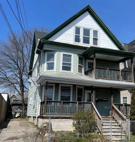 a front view of a house with balcony