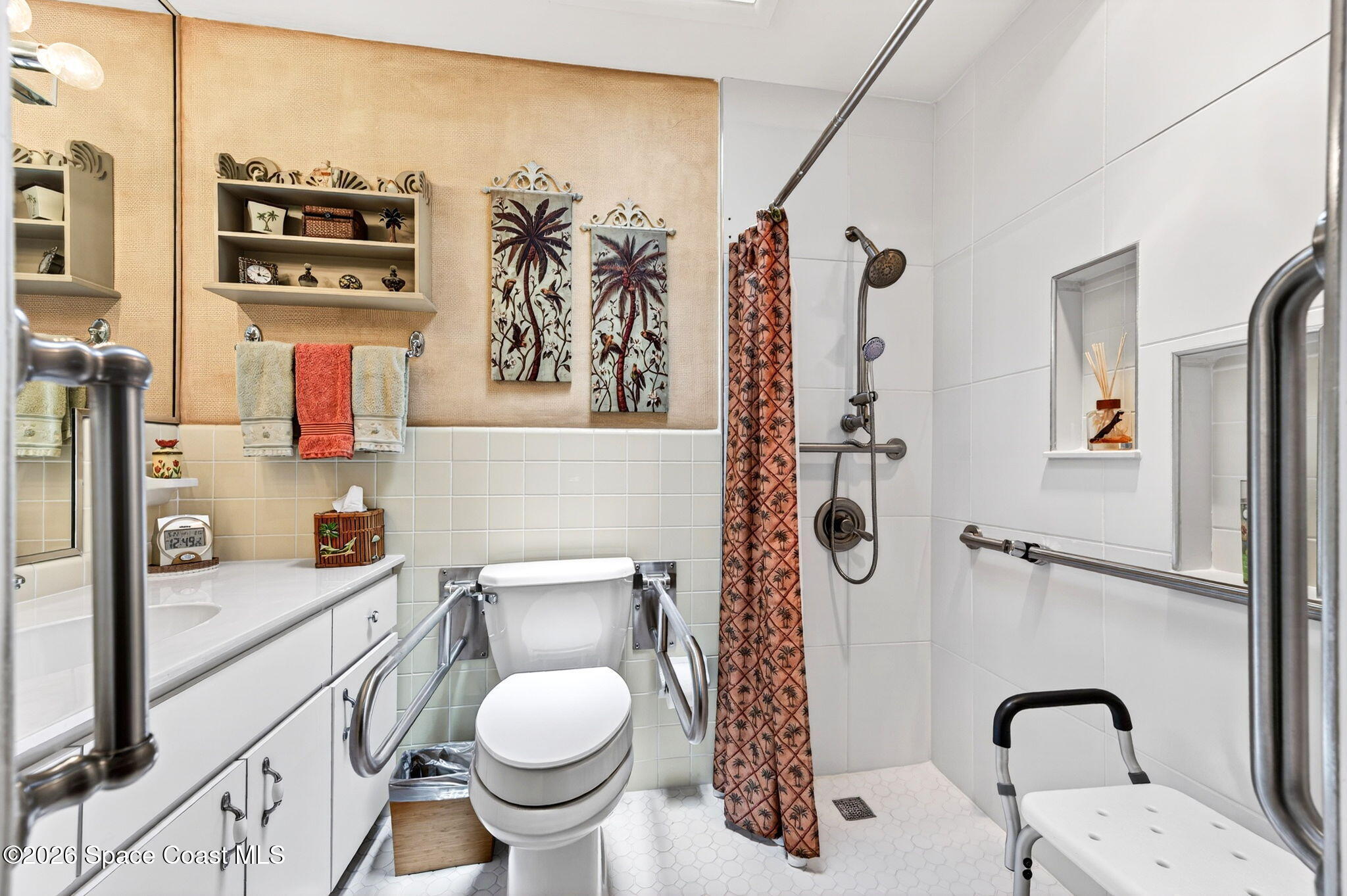 935 Samar Road Cocoa Beach, FL 32931 - Photo 16 of 22 a bathroom with a sink toilet and shower