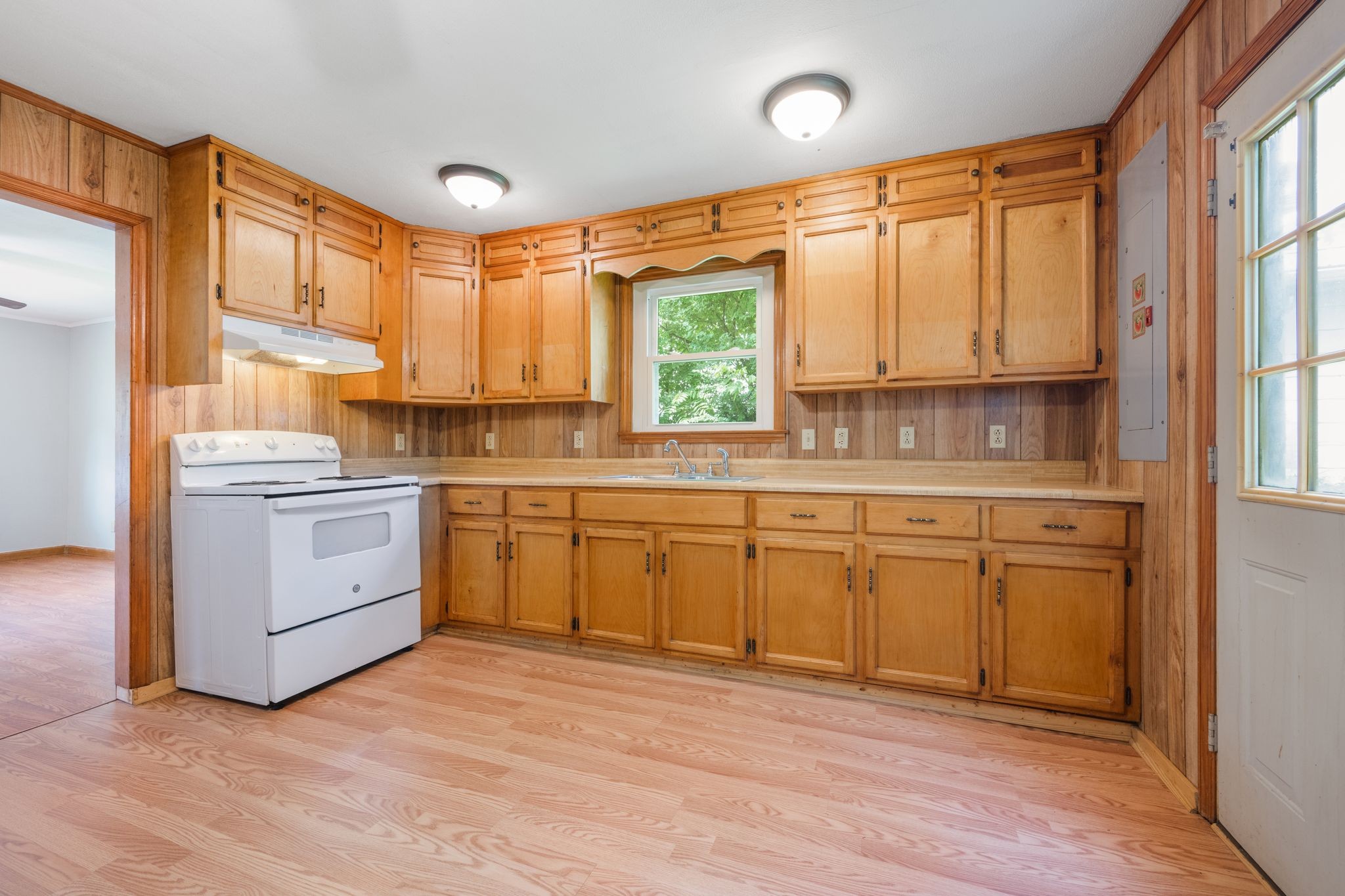 109 Riverside Drive Centerville, TN 37033 - Photo 14 of 29 a kitchen with a stove a sink and a window