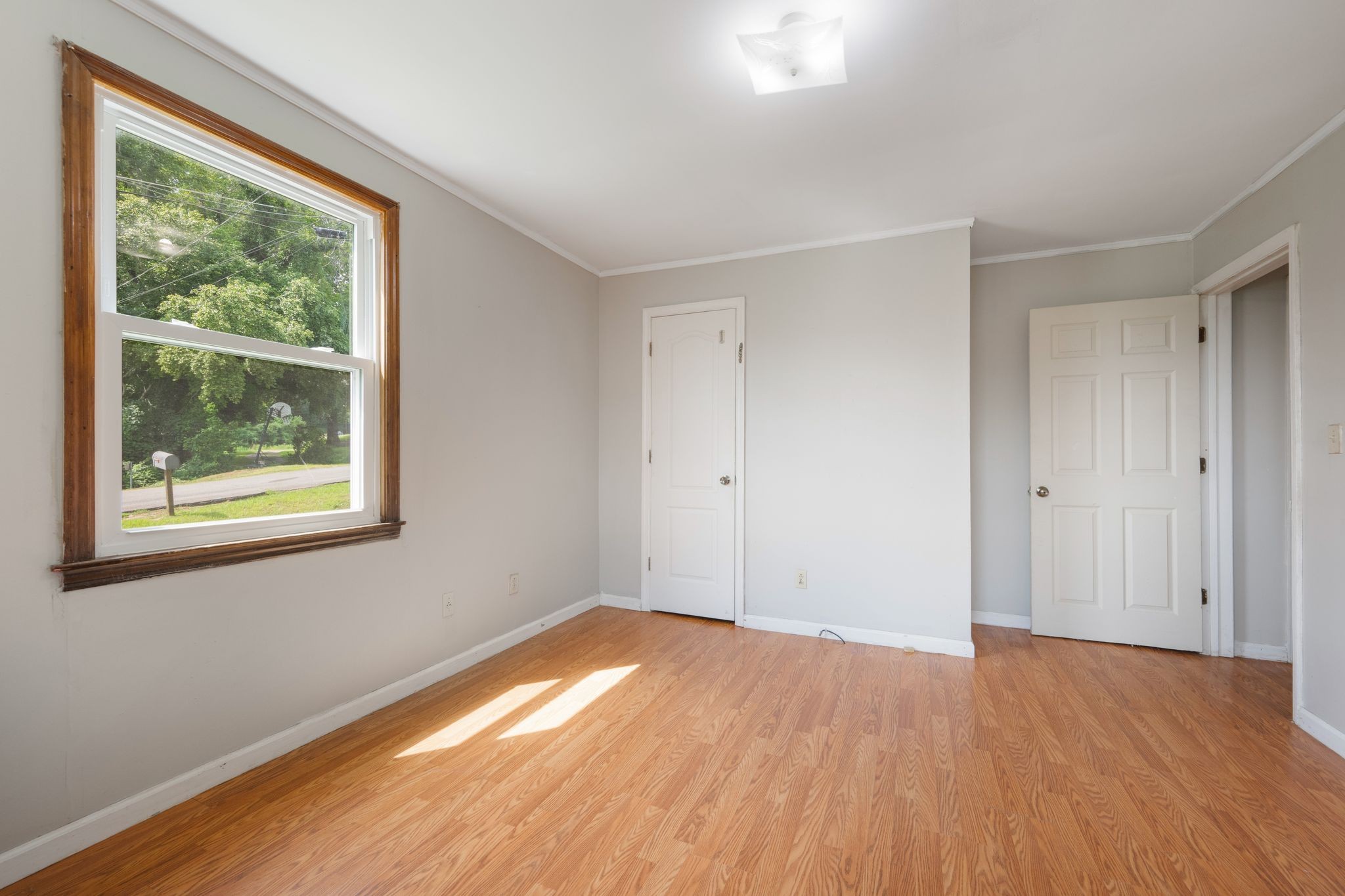 109 Riverside Drive Centerville, TN 37033 - Photo 20 of 29 a view of empty room with wooden floor and fan