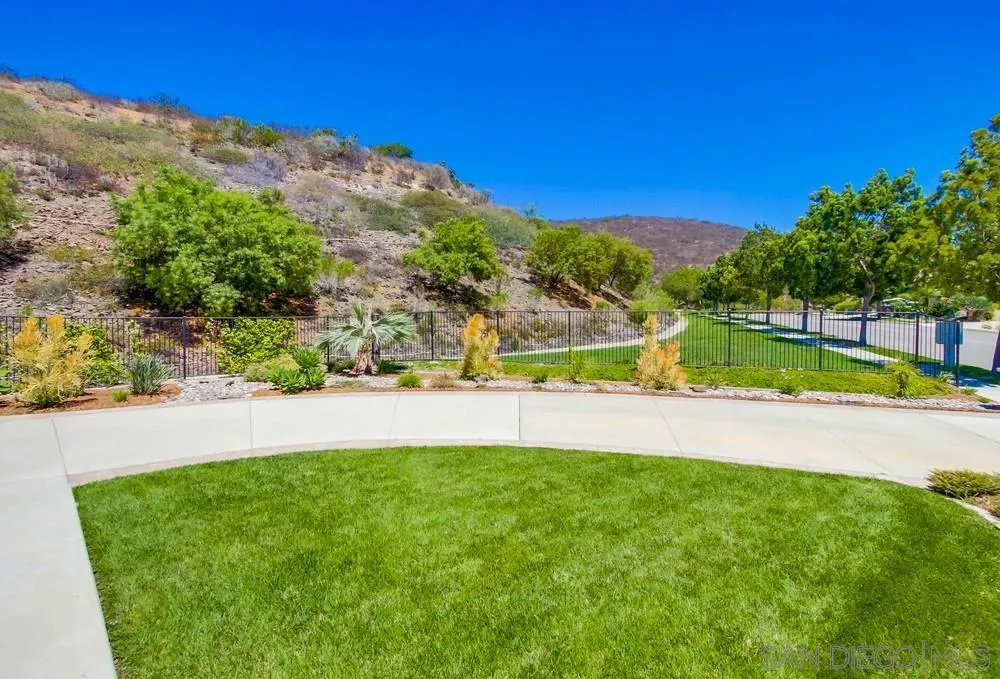 16123 Cayenne Ridge Road San Diego, CA 92127 - Photo 5 of 41 a view of yard with swimming pool and green space