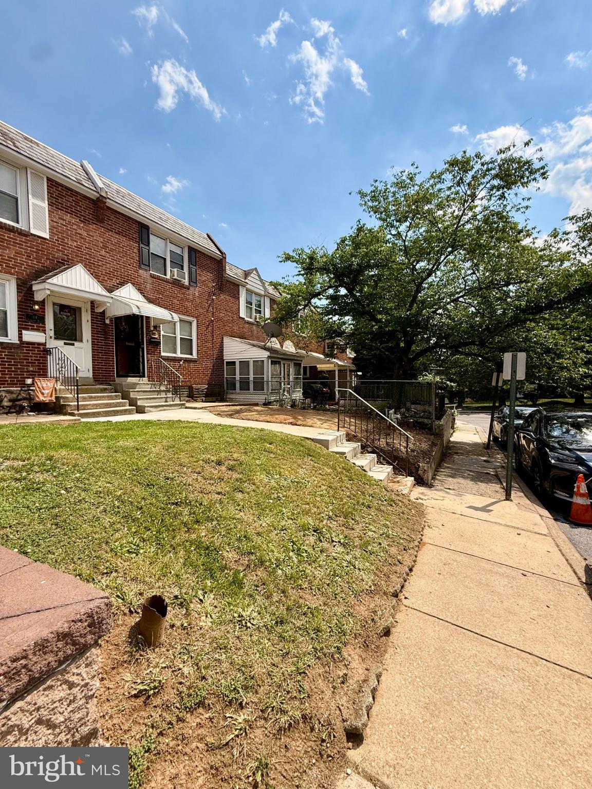 14 Concord Road Darby, PA 19023 - Photo 3 of 21 Charming brick home under sunny skies.