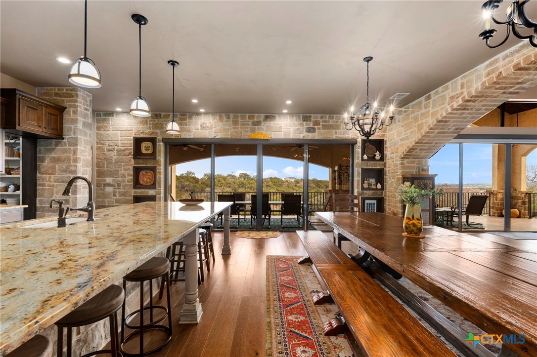 1039 Bluewater Place Spring Branch, TX 78070 - Photo 21 of 48 a large kitchen with a table and chairs