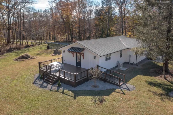 a kitchen with stainless steel appliances granite countertop a stove and a refrigerator