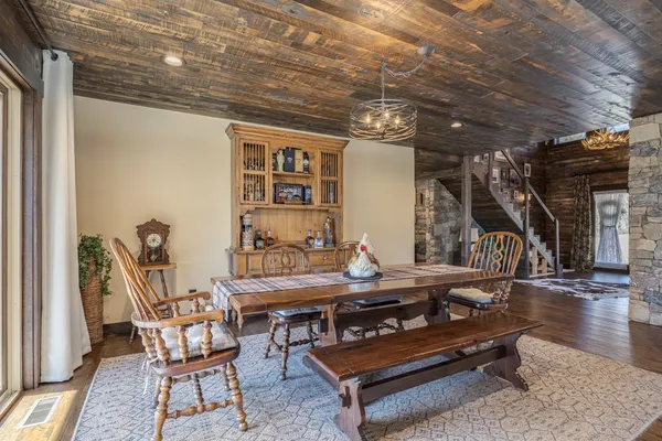 a view of a balcony with wooden floor
