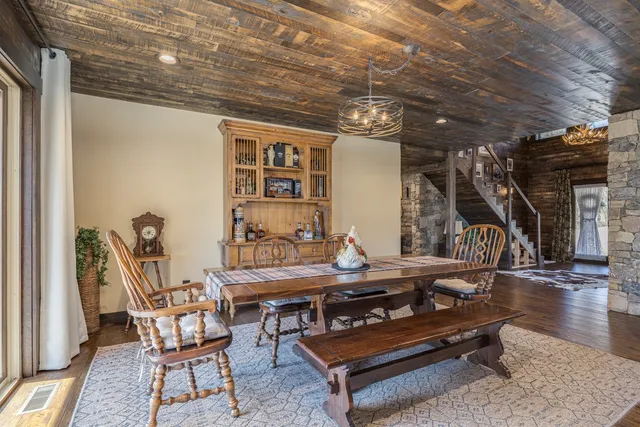 a view of a balcony with wooden floor