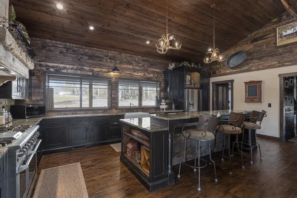 a view of balcony with floor to ceiling window with wooden floor